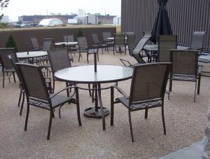 Exposed aggregate concrete patio with table
