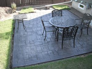 Stamped concrete decorative patio with table