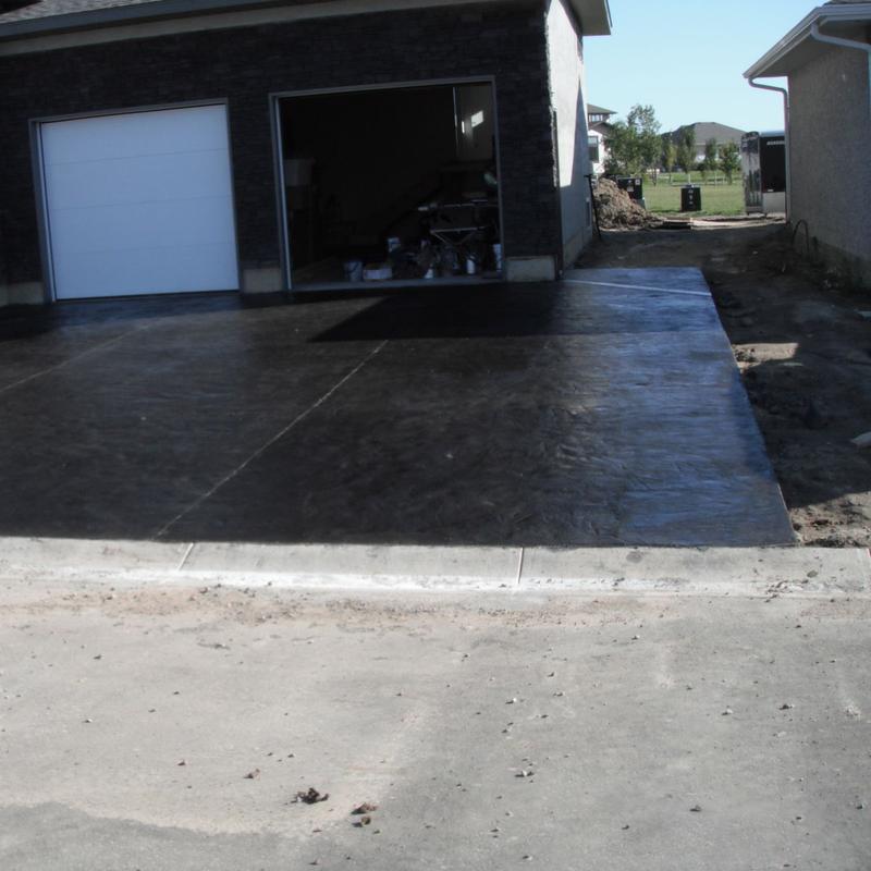 Coloured and stamped driveway with steps