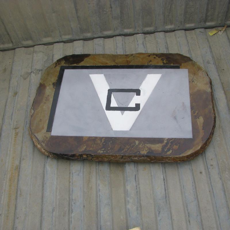 Concrete slab with logo inlay