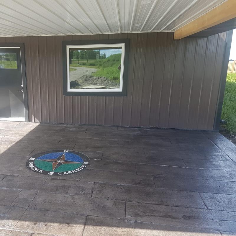 Decorative concrete compass with logo