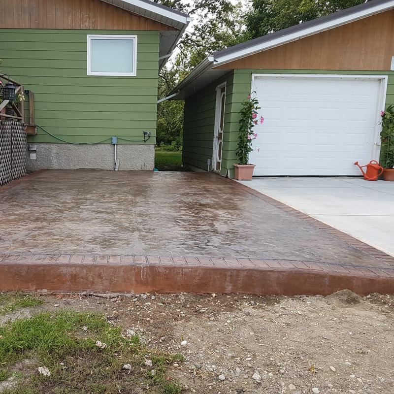 Stamped concrete pad with border