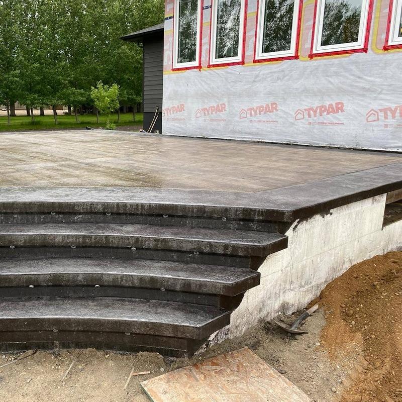 Stamped concrete patio with step