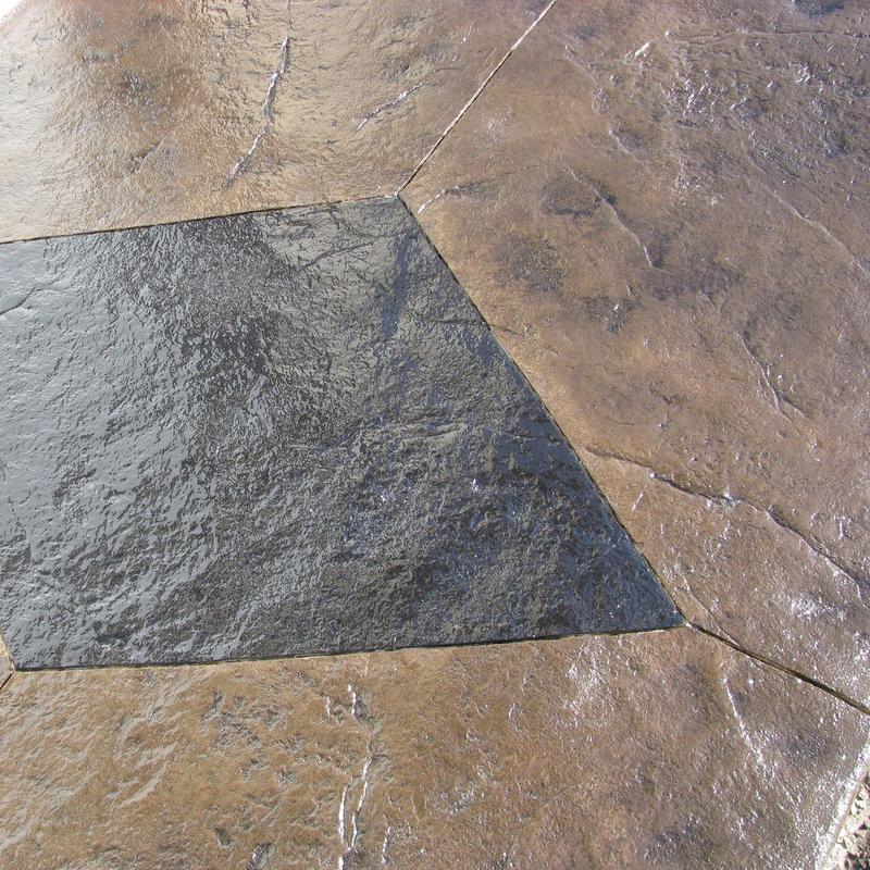 Stamped concrete with stained diamond