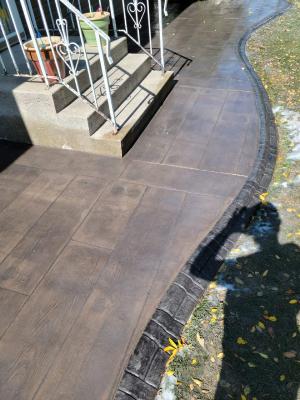 decorative stamped coloured concrete wood plank patio