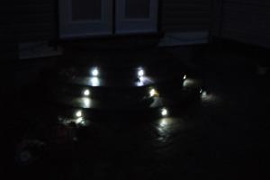 Decorative stamped concrete steps with lights off
