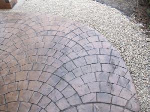 European fan decorative stamped concrete firepit