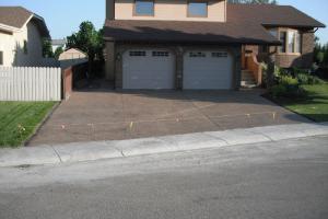 Exposed aggregate concrete driveway